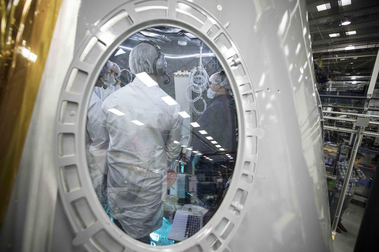 Engineers work inside the ECLSS module at SpaceX’s headquarters and factory in Hawthorne, California. The module is the same size as the company’s Crew Dragon spacecraft and is built to test the Environmental Control and Life Support System, or ECLSS, that is being built for missions aboard the Crew Dragon including those by astronauts flying to the International Space Station on flights for NASA’s Commercial Crew Program. Photo credit: SpaceX