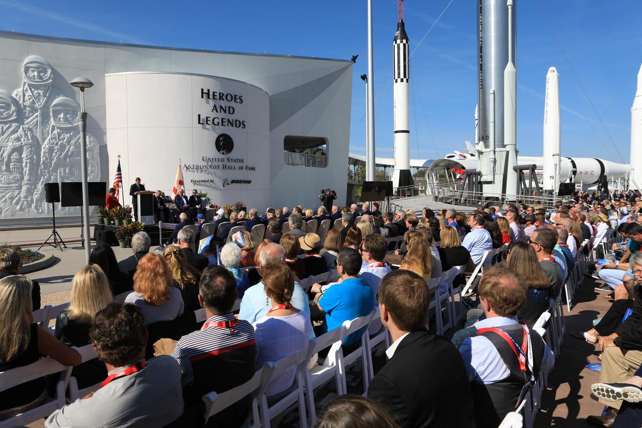 Boeing Vice President and General Manager John Elbon addresses the crowd gathered for the grand opening of the Heroes and Legends attraction at the Kennedy Space Center Visitor Complex. Boeing is sponsoring the new attraction. Launch vehicles used by NASA in its history of exploring space also are displayed in the "Rocket Garden" adjacent to the new Heroes and Legends facility. The new facility includes the U.S. Astronaut Hall of Fame and looks back to the pioneering efforts of Mercury, Gemini and Apollo. It sets the stage by providing the background and context for space exploration and the legendary men and women who pioneered the nation's journey into space.
