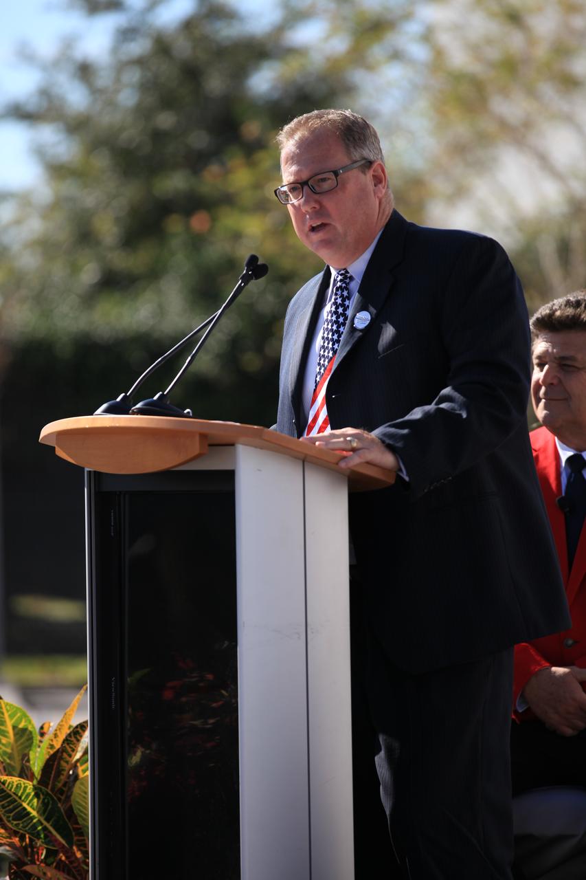 Therrin Protze, chief operating officer of the Kennedy Space Center Visitor Complex, speaks to guests during the opening of the Heroes and Legends attraction at the Kennedy Space Center Visitor Complex. The new facility includes the U.S. Astronaut Hall of Fame and looks back to the pioneering efforts of Mercury, Gemini and Apollo. It sets the stage by providing the background and context for space exploration and the legendary men and women who pioneered the nation's journey into space.