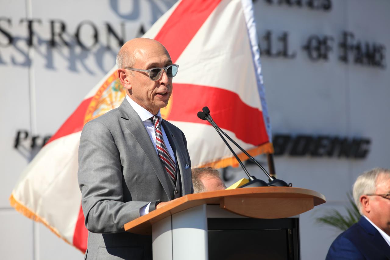 Rick Abramson, executive vice president and chief operating officer of Delaware North Companies Parks and Resorts, speaks to guests during the opening of the Heroes and Legends attraction at the Kennedy Space Center Visitor Complex. The new facility includes the U.S. Astronaut Hall of Fame and looks back to the pioneering efforts of Mercury, Gemini and Apollo. It sets the stage by providing the background and context for space exploration and the legendary men and women who pioneered the nation's journey into space.