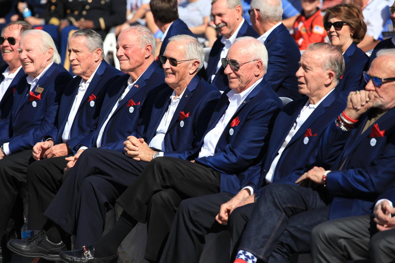 Members of the U.S. Astronaut Hall of Fame listen to speakers during the opening of the Heroes and Legends attraction at the Kennedy Space Center Visitor Complex. From the left are: Bob Crippen, Vance Brand, Ed Gibson, Jack Lousma, Charlie Duke, Al Worden, Walt Cunningham and Buzz Aldrin. The new facility includes the U.S. Astronaut Hall of Fame and looks back to the pioneering efforts of Mercury, Gemini and Apollo. It sets the stage by providing the background and context for space exploration and the legendary men and women who pioneered the nation's journey into space.