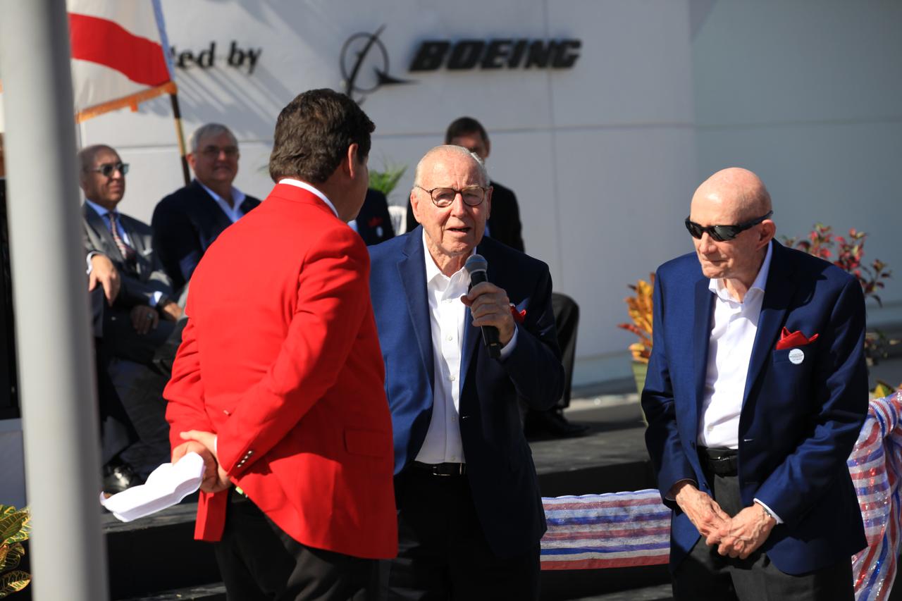 Former CNN space correspondent John Zarrella, left, interviews Gemini and Apollo astronauts Jim Lovell, center and Tom Stafford during opening ceremonies for the Heroes and Legends attraction at the Kennedy Space Center Visitor Complex. The new facility includes the U.S. Astronaut Hall of Fame and looks back to the pioneering efforts of Mercury, Gemini and Apollo. It sets the stage by providing the background and context for space exploration and the legendary men and women who pioneered the nation's journey into space.