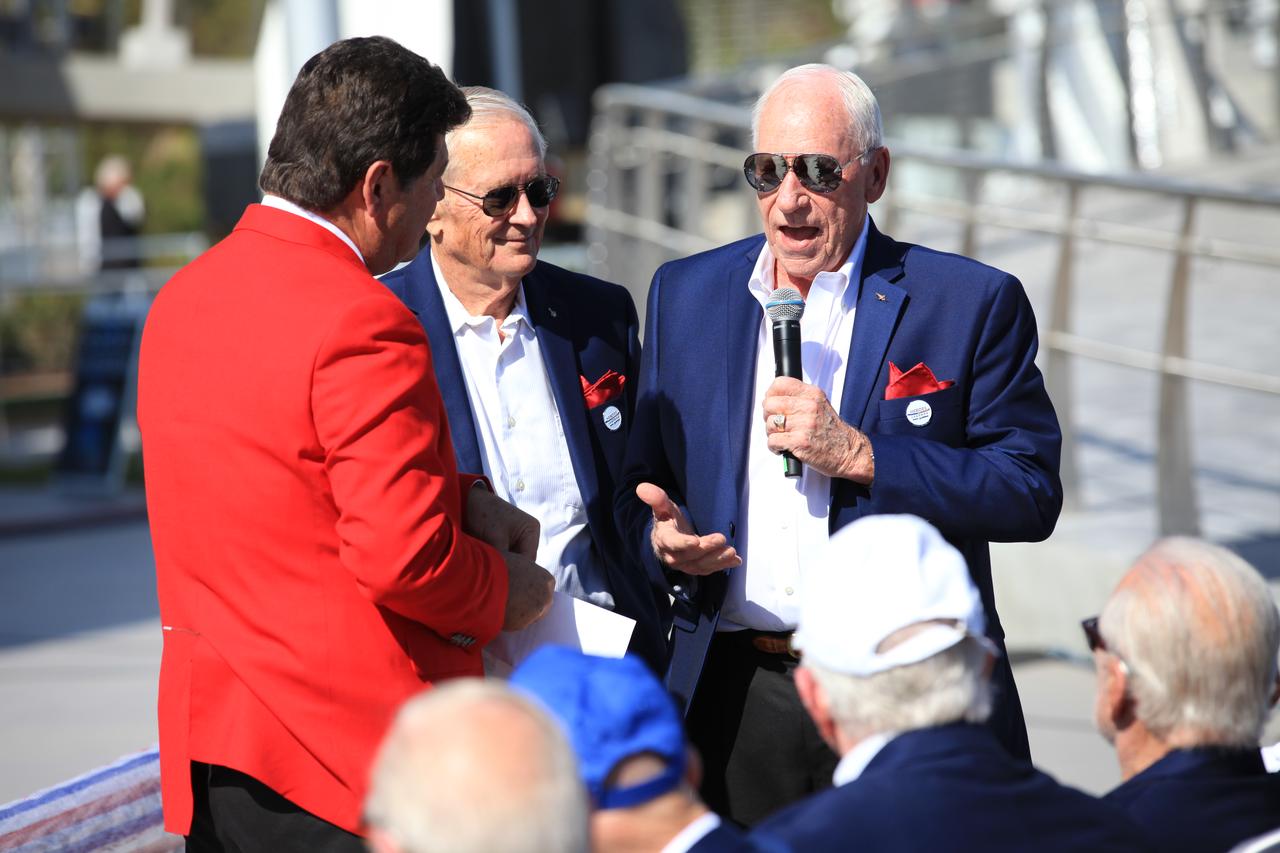 Former CNN space correspondent John Zarrella, left, interviews Apollo astronauts Charlie Duke, center and Walt Cunningham during opening ceremonies for the Heroes and Legends attraction at the Kennedy Space Center Visitor Complex. The new facility includes the U.S. Astronaut Hall of Fame and looks back to the pioneering efforts of Mercury, Gemini and Apollo. It sets the stage by providing the background and context for space exploration and the legendary men and women who pioneered the nation's journey into space.