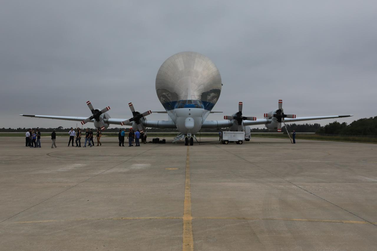 NASA’s Super Guppy aircraft arrives on the tarmac after touching down at the Shuttle Landing Facility at the agency’s Kennedy Space Center in Florida. The guppy is carrying the Orion crew module structural test article (STA). The STA will be offloaded and transported to the Neil Armstrong Operations and Checkout Building high bay for further testing. Photo credit: NASA/Kim Shiflett