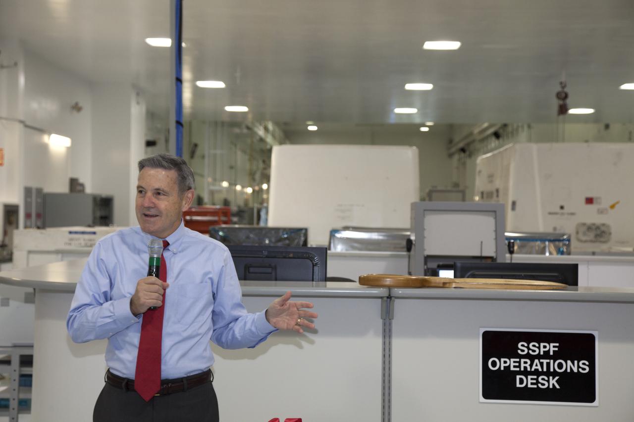 Kennedy Space Center Director Bob Cabana speaks to guests during a ribbon cutting ceremony in the high bay of the Space Station Processing Facility at the Florida spaceport. The event celebrated completion of facility modifications to improve processing and free up zones tailored to a variety of needs supporting a robust assortment of space-bound hardware including NASA programs and commercial space companies.