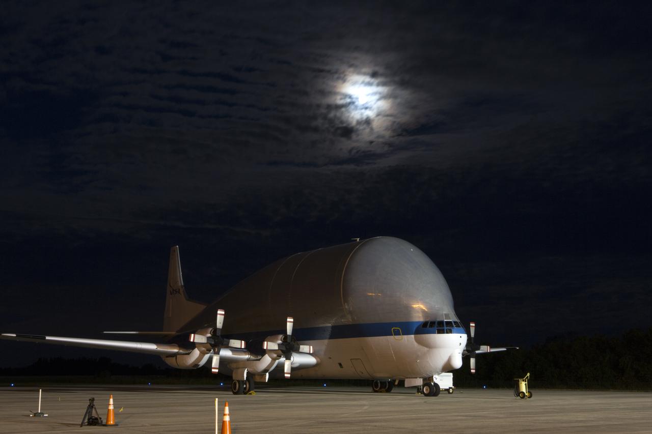 NASA’s Super Guppy aircraft, carrying the Orion crew module structural test article (STA), arrives at the Shuttle Landing Facility operated by Space Florida at NASA’s Kennedy Space Center in Florida. The STA will be offloaded and transported to the Neil Armstrong Operations and Checkout Building high bay for further testing. The Orion spacecraft will launch atop NASA’s Space Launch System rocket on EM-1, its first deep space mission, in late 2018.