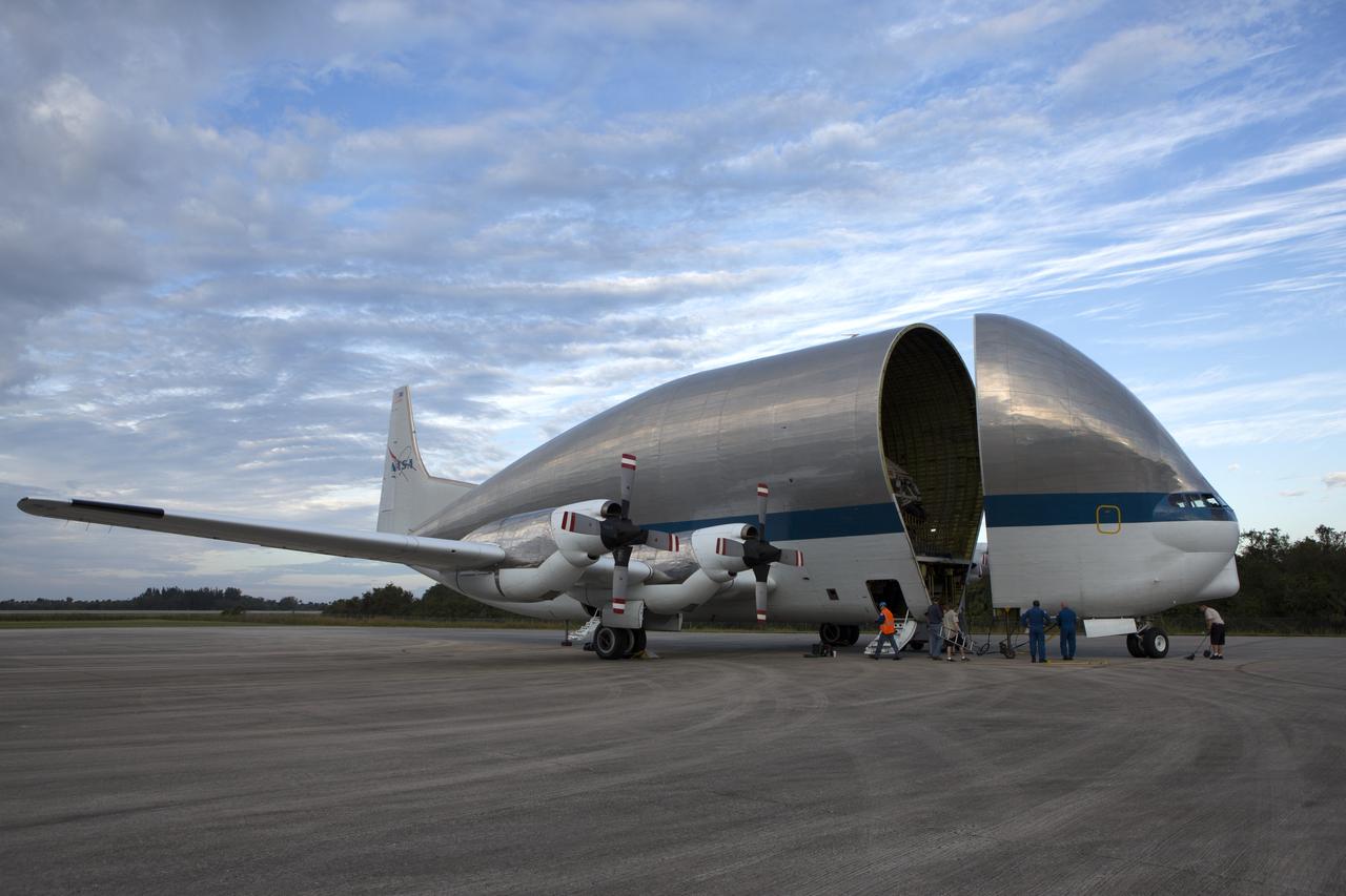 NASA’s Super Guppy aircraft, carrying the Orion crew module structural test article (STA), arrived at the Shuttle Landing Facility operated by Space Florida at NASA’s Kennedy Space Center in Florida. The front of the unique aircraft is being opened to offload the STA. The test article will be transported to the Neil Armstrong Operations and Checkout Building high bay for further testing. The Orion spacecraft will launch atop NASA’s Space Launch System rocket on EM-1, its first deep space mission, in late 2018.