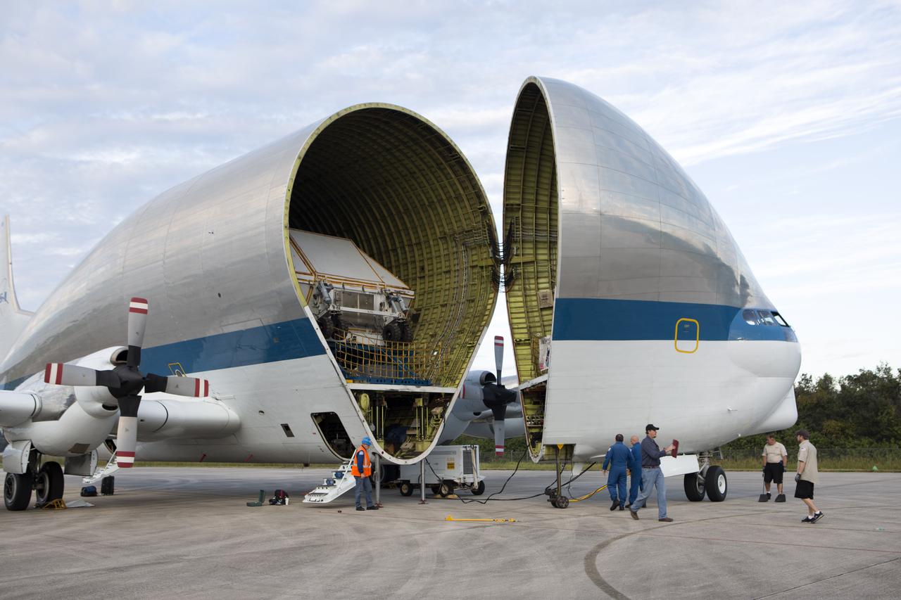 NASA’s Super Guppy aircraft, carrying the Orion crew module structural test article (STA), arrived at the Shuttle Landing Facility operated by Space Florida at NASA’s Kennedy Space Center in Florida. The unique aircraft is being opened to offload the STA. The test article will be transported to the Neil Armstrong Operations and Checkout Building high bay for further testing. The Orion spacecraft will launch atop NASA’s Space Launch System rocket on EM-1, its first deep space mission, in late 2018.