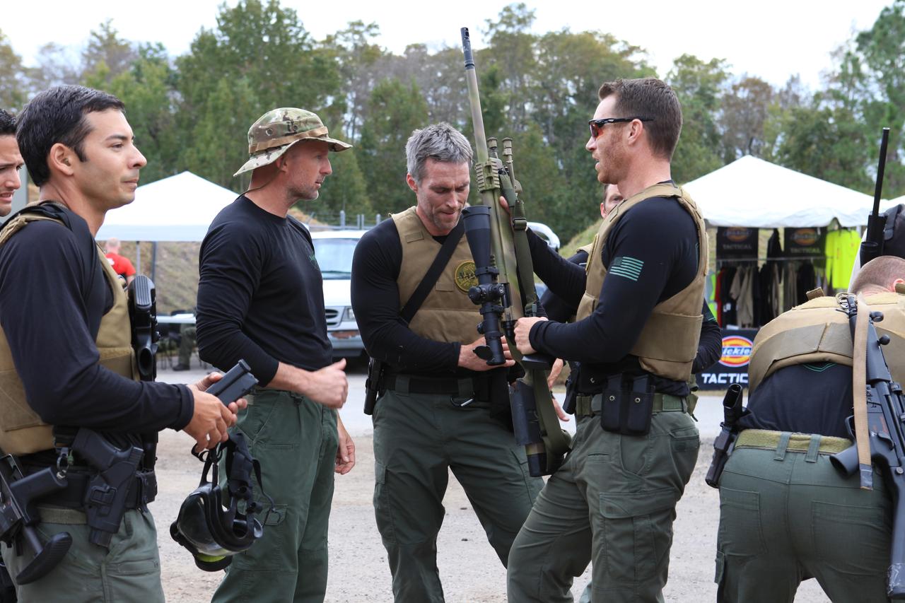 NASA Kennedy Space Center's Emergency Response Team members check their firearms before competing in the 34th Annual SWAT Round-up International at the Lawson Lamar Firearms and Tactical Training Center in Orlando, Florida. The competition was held Nov. 15 to 18, and featured five different competition categories. Kennedy's ERT members exchanged best practices and competed with 60 teams from the U.S. and around the world. 