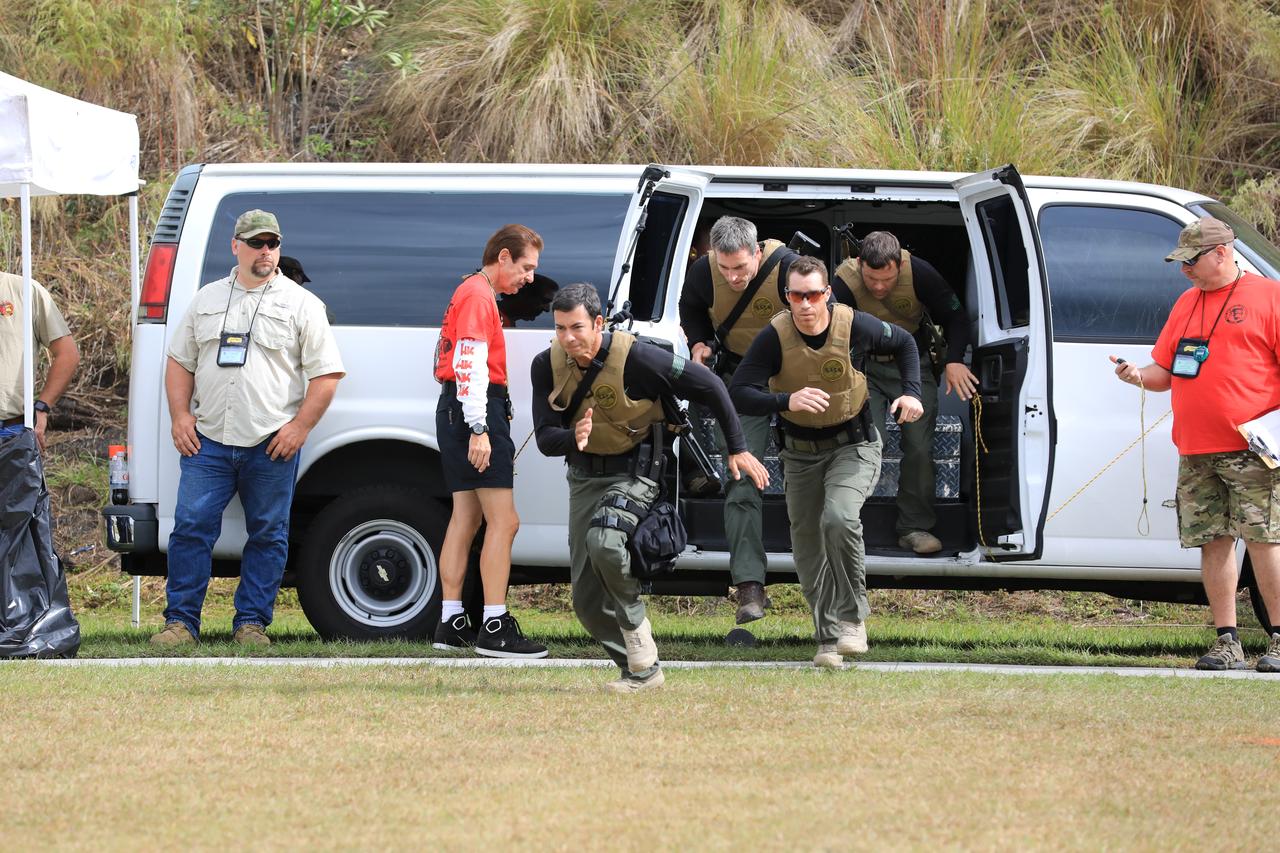 NASA Kennedy Space Center's Emergency Response Team members are timed as they exit a security vehicle during the 34th Annual SWAT Round-up International at the Lawson Lamar Firearms and Tactical Training Center in Orlando, Florida. The competition was held Nov. 15 to 18, and featured five different competition categories. Kennedy's ERT members exchanged best practices and competed with 60 teams from the U.S. and around the world. 