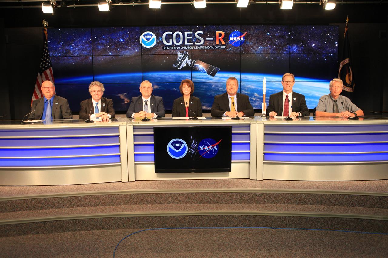 NASA and industry leaders participate in a Geostationary Operational Environmental Satellite (GOES-R), prelaunch news conference in the Kennedy Space Center's Press Site auditorium in Florida. NASA and industry leaders include: Michael Curie, of NASA Communications; Stephen Volz, assistant administrator for satellite and information services, National Oceanic and Atmospheric Administration (NOAA's); Greg Mandt, GOES-R system program director, NOAA; Sandra Smalley, director, Joint Agency Satellite Division, NASA Headquarters; Omar Baez, launch director, NASA Kennedy; Scott Messer, program manager, NASA Missions, United Launch Alliance; and Clay Flinn, launch weather officer, 4th Weather Squadron, Cape Canaveral Air Force Station.