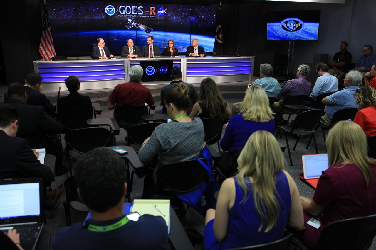 In the Kennedy Space Center's Press Site auditorium, members of the media participate in a mission briefing on the Geostationary Operational Environmental Satellite (GOES-R). Briefing participants from left are: Sean Potter of NASA Communications; Steven Goodman, NOAA's GOES-R program scientist; Joseph A. Pica, director of the National Weather Service Office of Observations; Sandra Cauffman, deputy director of NASA's Earth Science Division; and Damon Penn, assistant administrator for response at the Federal Emergency Management Agency. GOES-R is the first satellite in a series of next-generation GOES satellites for NOAA, the National Oceanographic and Atmospheric Administration. It will launch to a geostationary orbit over the western hemisphere to provide images of storms and help meteorologists predict severe weather conditionals and develop long-range forecasts.