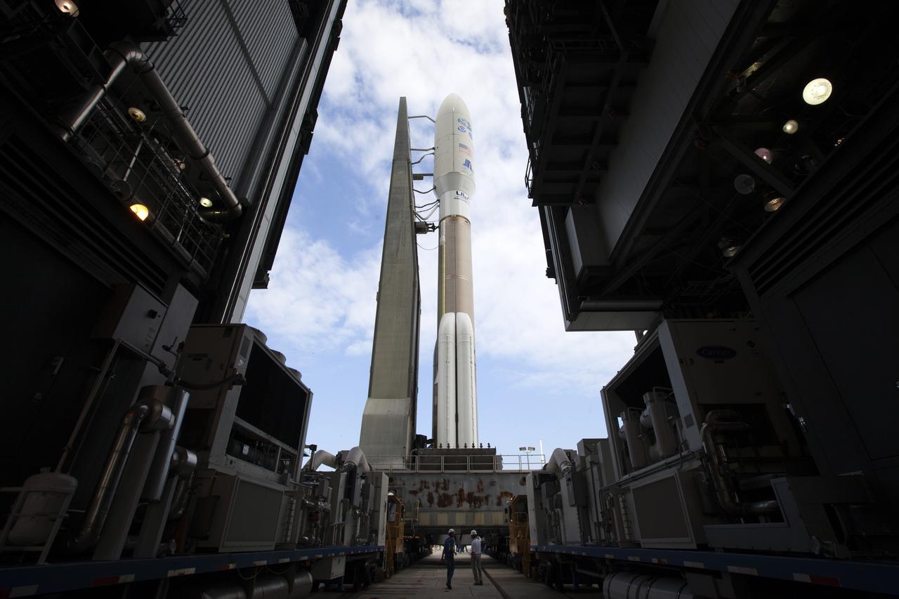 With blue sky in the background, a United Launch Alliance Atlas V rocket begins its rollout from the Vehicle Integration Facility to Space Launch Complex 41 at Cape Canaveral Air Force Station in Florida. The launch vehicle will send the Geostationary Operational Environmental Satellite (GOES-R) to a geostationary position over the U.S. GOES-R is the first satellite in a series of next-generation NOAA GOES satellites. 