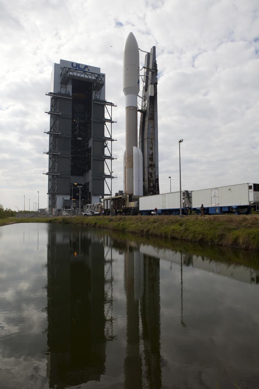 Reflected in the water, a United Launch Alliance Atlas V rocket arrives at Space Launch Complex 41 at Cape Canaveral Air Force Station in Florida. The launch vehicle will send the Geostationary Operational Environmental Satellite (GOES-R) to a geostationary position over the U.S. GOES-R is the first satellite in a series of next-generation NOAA GOES satellites. 