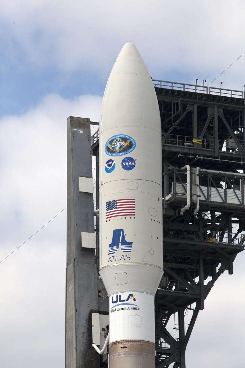 A United Launch Alliance Atlas V rocket arrives at Space Launch Complex 41 at Cape Canaveral Air Force Station in Florida. In view is the upper stage and payload fairing containing the Geostationary Operational Environmental Satellite (GOES-R). The launch vehicle will send GOES-R to a geostationary position over the U.S. GOES-R is the first satellite in a series of next-generation NOAA GOES satellites. 