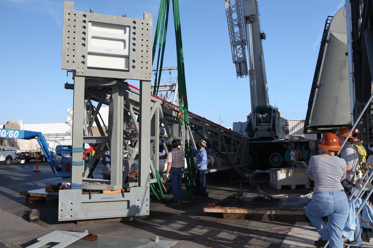 Efforts are underway to lift the Core State Inter-tank Umbilical (CSITU) for NASA's Space Launch System (SLS) at the Launch Equipment Test Facility at the agency's Kennedy Space Center in Florida. The CSITU will be attached to the "C" tower of the Vehicle Motion Simulator 2 test fixture. The umbilical will undergo a series of tests to confirm it is functioning properly and ready to support the SLS rocket for launch. The CSITU is a swing arm umbilical that will connect to the SLS core stage inter-tank. The umbilical's main function is to vent gaseous hydrogen from the core stage. The arm also provides conditioned air, pressurized gases, and power and data connection to the core stage. The center’s Engineering Directorate and the Ground Systems Development and Operations Program are overseeing processing and testing of the umbilicals. 