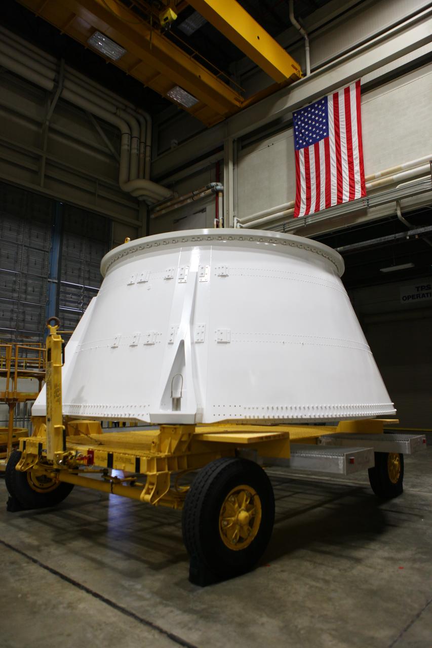 The right hand aft skirt for NASA's Space Launch System (SLS) rocket has been refurbished and painted and is ready for the assembly process in the Booster Fabrication Facility at the agency's Kennedy Space Center in Florida. The aft skirt was refurbished and painted in support facilities at the Hangar AF facility at Cape Canaveral Air Force Station in Florida. The space shuttle-era aft skirt will be used on the right hand booster of the SLS for Exploration Mission 1 (EM-1). NASA is preparing for EM-1, deep space missions, and the Journey to Mars. 