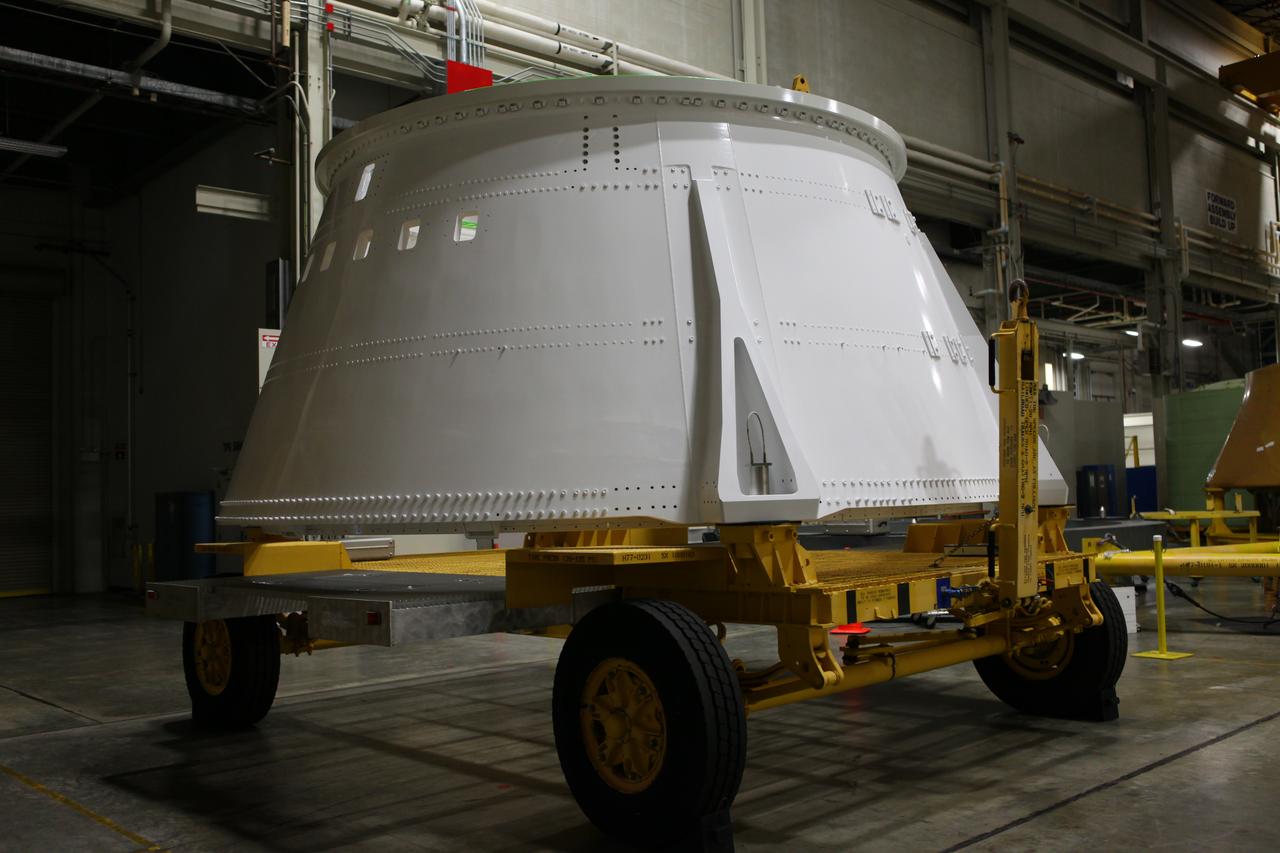 The right hand aft skirt for NASA's Space Launch System (SLS) rocket has been refurbished and painted and is ready for the assembly process in the Booster Fabrication Facility at the agency's Kennedy Space Center in Florida. The aft skirt was refurbished and painted in support facilities at the Hangar AF facility at Cape Canaveral Air Force Station in Florida. The space shuttle-era aft skirt will be used on the right hand booster of the SLS for Exploration Mission 1 (EM-1). NASA is preparing for EM-1, deep space missions, and the Journey to Mars. 