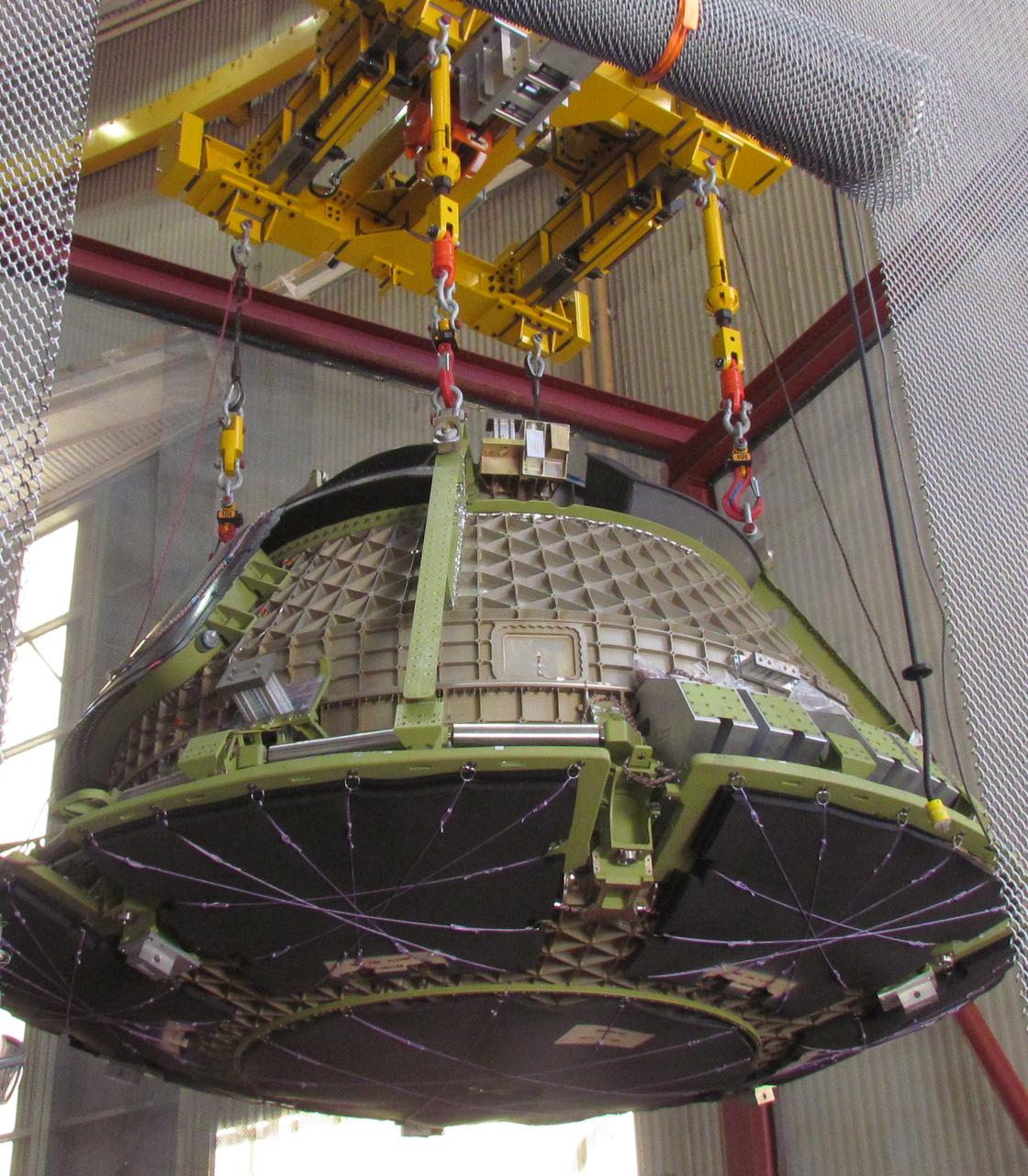Boeing’s Structural Test Article of its CST-100 Starliner spacecraft arrives at the company’s Huntington Beach, California, facilities for evaluations. Built to the specifications of an operational spacecraft, the STA is intended to be evaluated through a series of thorough testing conditions.