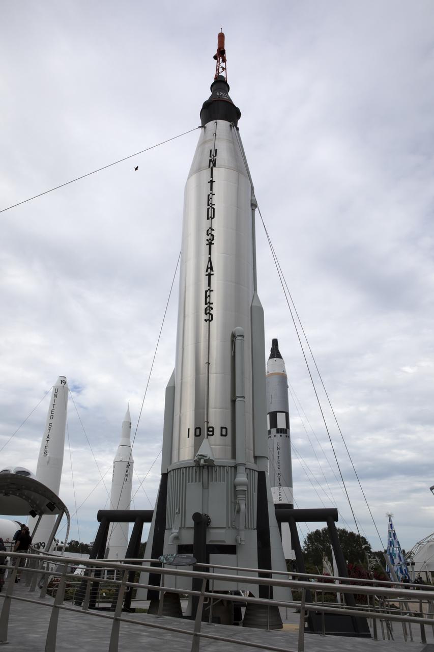 An Atlas rocket and Mercury capsule like the ones that carried Sen. John Glenn into Earth orbit in February 1962 stand in the Rocket Garden at the Kennedy Space Center Visitor Complex adjacent to the Heroes and Legends exhibit hall where Glenn was remembered during a ceremony Dec. 9, 2016. Glenn, one of the Mercury Seven astronauts NASA chose to fly the first missions of the Space Age, passed away on Dec. 8, 2016, at age 95. He gained worldwide acclaim during his Mercury mission that made him the first American to orbit the Earth. He flew again in 1998 aboard space shuttle Discovery at age 77. 