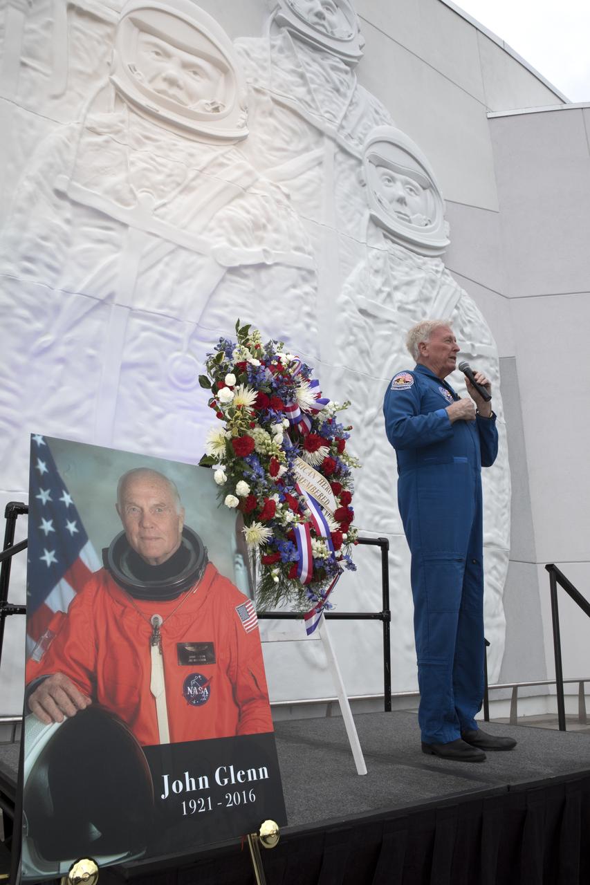 Former space shuttle astronaut Jon McBride speaks at the Heroes and Legends exhibit hall at the Kennedy Space Center Visitor Complex during a ceremony remembering astronaut Sen. John Glenn who passed away Dec. 8, 2016 at age 95. Glenn, one of the first seven astronauts NASA chose to fly the first missions of the Space Age, gained worldwide acclaim during his Mercury mission that made him the first American to orbit the Earth. He flew again in 1998 aboard space shuttle Discovery at age 77.