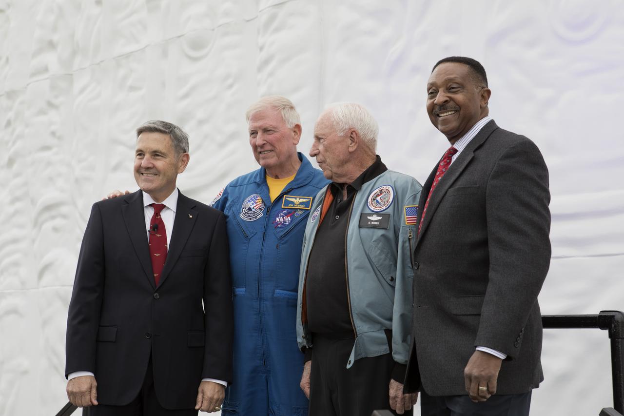 Former astronauts Bob Cabana, director of NASA's Kennedy Space Center in Florida, from left, Jon McBride, Al Worden and Winston Scott pose outside the Heroes and Legends exhibit hall at the Kennedy Space Center Visitor Complex following a ceremony remembering astronaut Sen. John Glenn, who passed away Dec. 8, 2016 at age 95. Glenn, one of the first seven astronauts NASA chose to fly the first missions of the Space Age, gained worldwide acclaim during his Mercury mission that made him the first American to orbit the Earth. He flew again in 1998 aboard space shuttle Discovery at age 77.