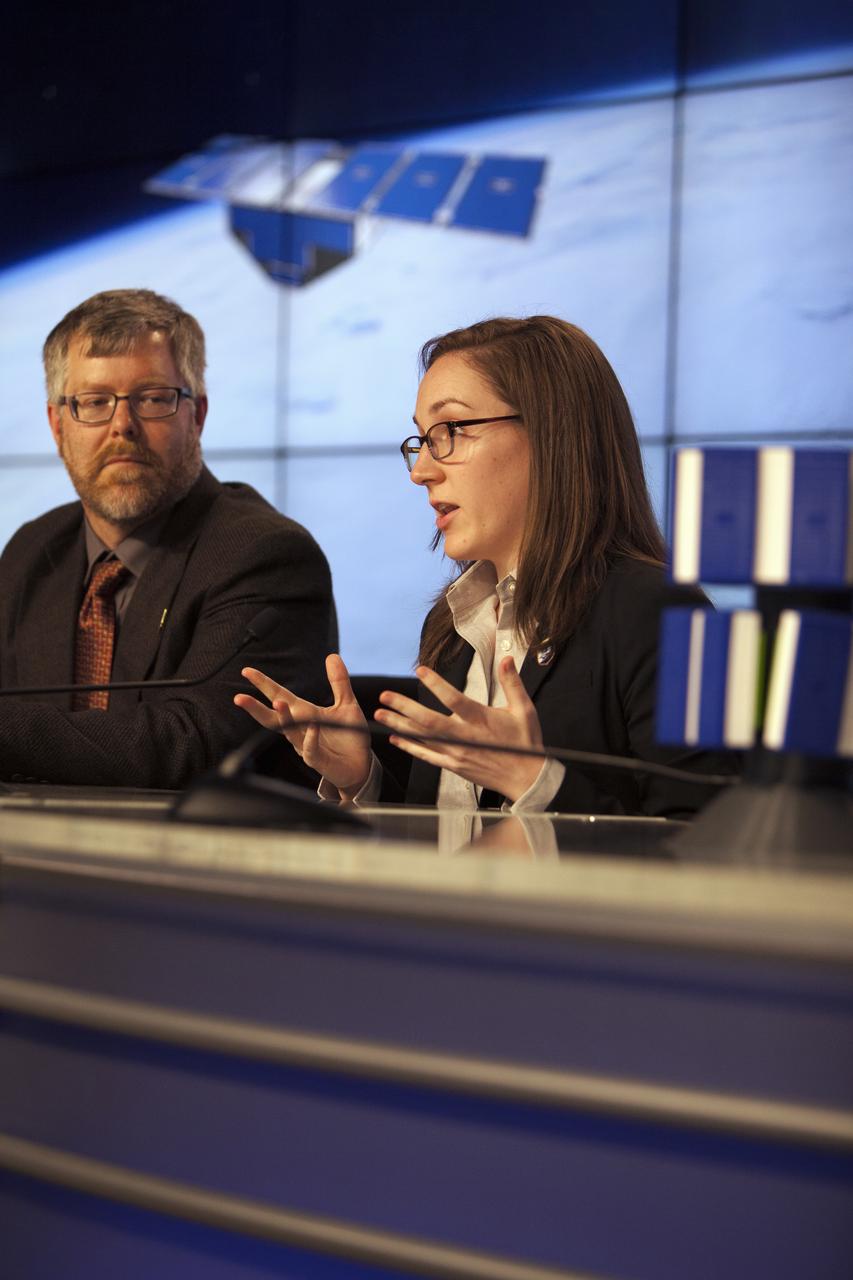 In the Kennedy Space Center’s Press Site auditorium, NASA and industry leaders speak to members of the media during a mission science briefing for the agency’s Cyclone Global Navigation Satellite System, or CYGNSS, spacecraft. From left are: Aaron Ridley, CYGNSS constellation scientist in the Climate and Space Department at the University of Michigan in Ann Arbor, Michigan; and Mary Morris, doctoral student in the Department of Climate and Space Sciences and Engineering at the University of Michigan. The eight CYGNSS satellites will make frequent and accurate measurements of ocean surface winds throughout the life cycle of tropical storms and hurricanes. The data will help scientists probe key air-sea interaction processes that take place near the core of storms, which are rapidly changing and play a crucial role in the beginning and intensification of hurricanes.