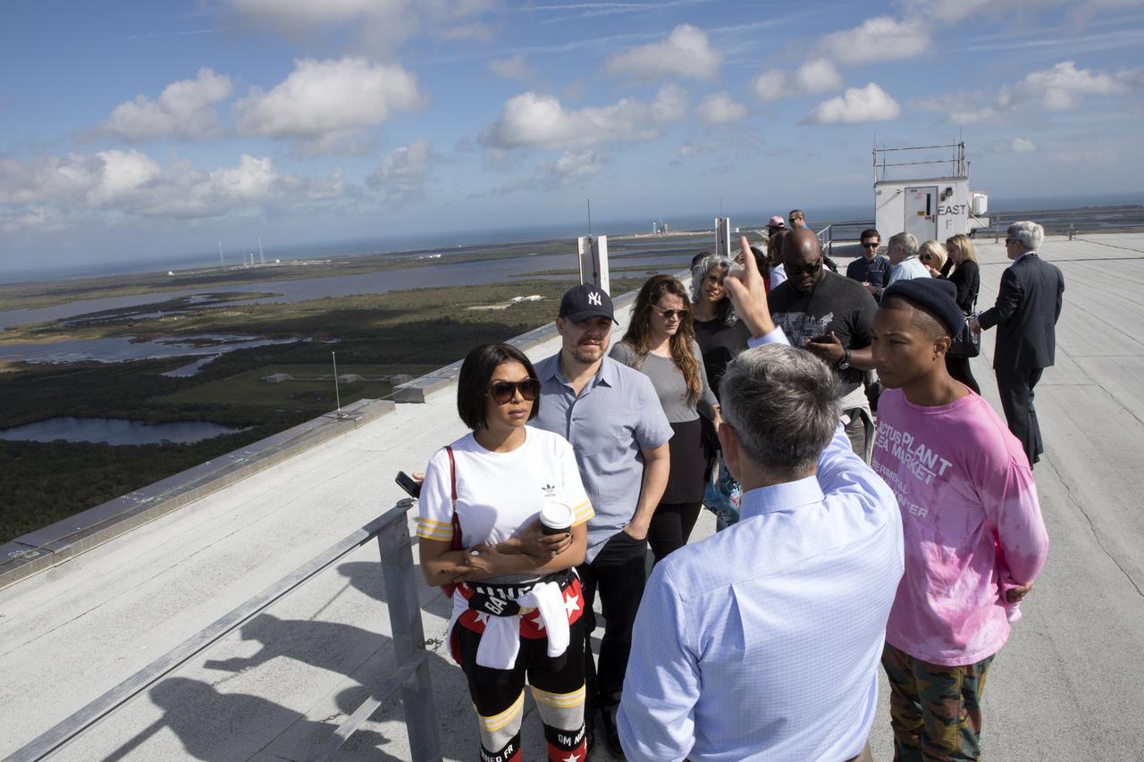 During a tour for cast and crew members of the upcoming motion picture "Hidden Figures," Kennedy Space Center Director Bob Cabana describes the view from the roof of the Vehicle Assembly Building. The movie is based on the book of the same title, by Margot Lee Shetterly. It chronicles the lives of Katherine Johnson, Dorothy Vaughan and Mary Jackson, three African-American women who worked for NASA as human "computers.” Their mathematical calculations were crucial to the success of Project Mercury missions including John Glenn’s orbital flight aboard Friendship 7 in 1962. The film is due in theaters in January 2017.