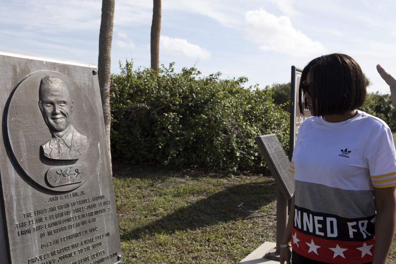 Taraji P. Henson, who portrays Katherine Johnson in the upcoming motion picture "Hidden Figures," reads the inscription on a plaque honoring NASA astronaut John Glenn. It is located at the entrance to Launch Pad 14 at Cape Canaveral Air Force Station. It was the location of the launch of Glenn and three other astronauts who flew orbital missions during Project Mercury. The movie is based on the book of the same title, by Margot Lee Shetterly. It chronicles the lives of Katherine Johnson, Dorothy Vaughan and Mary Jackson, three African-American women who worked for NASA as human "computers.” Their mathematical calculations were crucial to the success of Project Mercury missions including Glenn’s orbital flight aboard Friendship 7 in 1962. The film is due in theaters in January 2017.