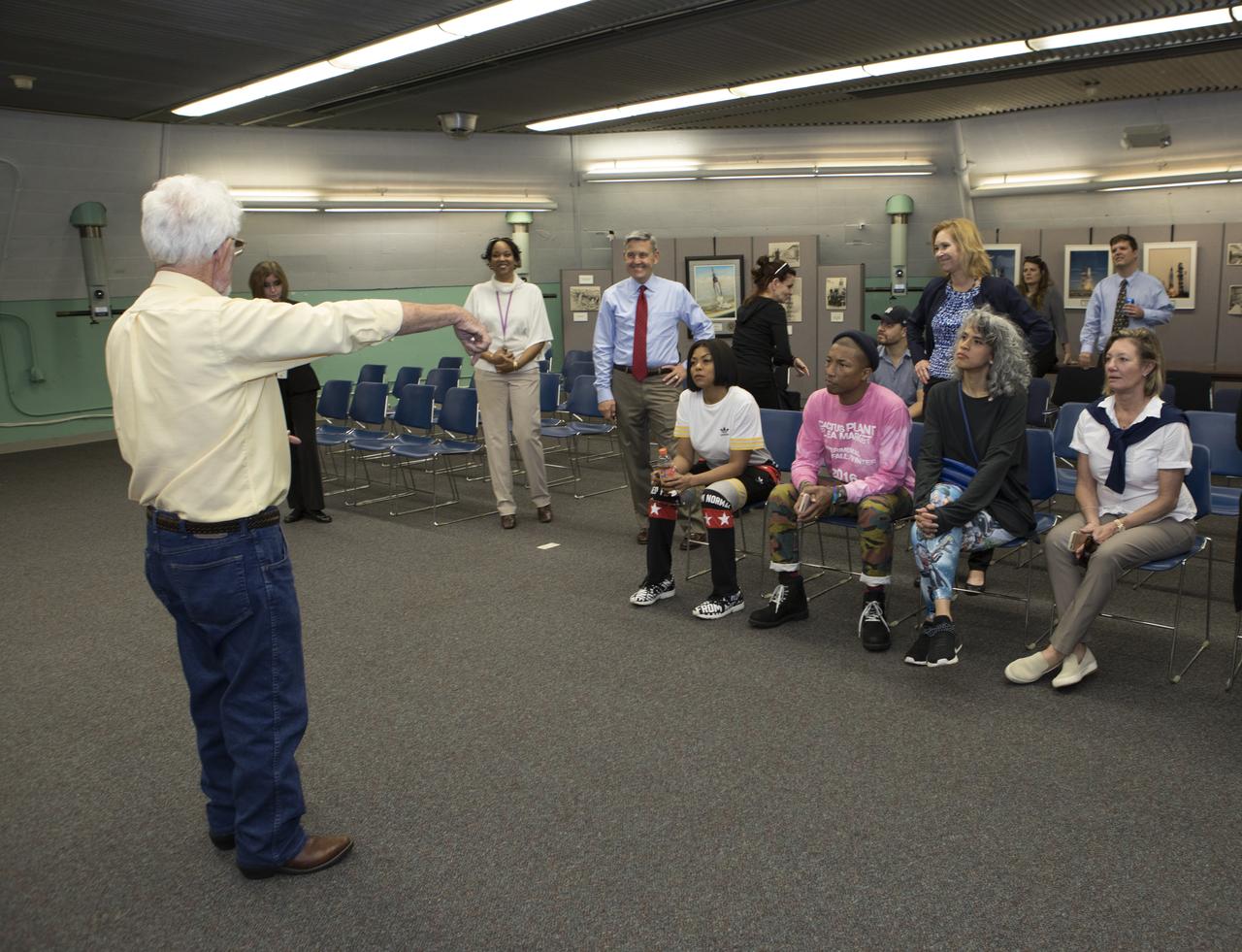 In the blockhouse at Cape Canaveral Air Force Station's Launch Pad 14, Sonny Witt, director of Operations for the 45th Mission Support Group at the Cape speaks to Kennedy Space Center Director Bob Cabana along with cast and crew members of the upcoming motion picture "Hidden Figures." Pad 14 was the location of the launch of John Glenn and three other astronauts who flew orbital missions during Project Mercury. The movie is based on the book of the same title, by Margot Lee Shetterly. It chronicles the lives of Katherine Johnson, Dorothy Vaughan and Mary Jackson, three African-American women who worked for NASA as human "computers.” Their mathematical calculations were crucial to the success of Project Mercury missions including Glenn’s orbital flight aboard Friendship 7 in 1962. The film is due in theaters in January 2017.