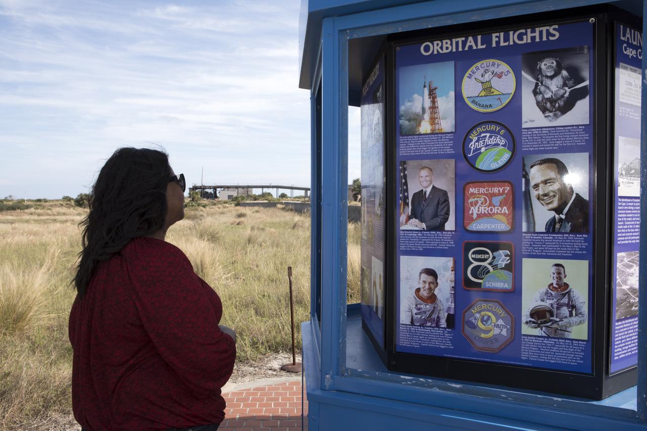 Octavia Spencer, who portrays Dorothy Vaughan in the upcoming motion picture "Hidden Figures," looks at a display near Launch Pad 14 at Cape Canaveral Air Force Station. The pad, seen in the background, was the location of the launch of John Glenn and three other astronauts who flew orbital missions during Project Mercury. The movie is based on the book of the same title, by Margot Lee Shetterly. It chronicles the lives of Katherine Johnson, Dorothy Vaughan and Mary Jackson, three African-American women who worked for NASA as human "computers.” Their mathematical calculations were crucial to the success of Project Mercury missions including Glenn’s orbital flight aboard Friendship 7 in 1962. The film is due in theaters in January 2017.