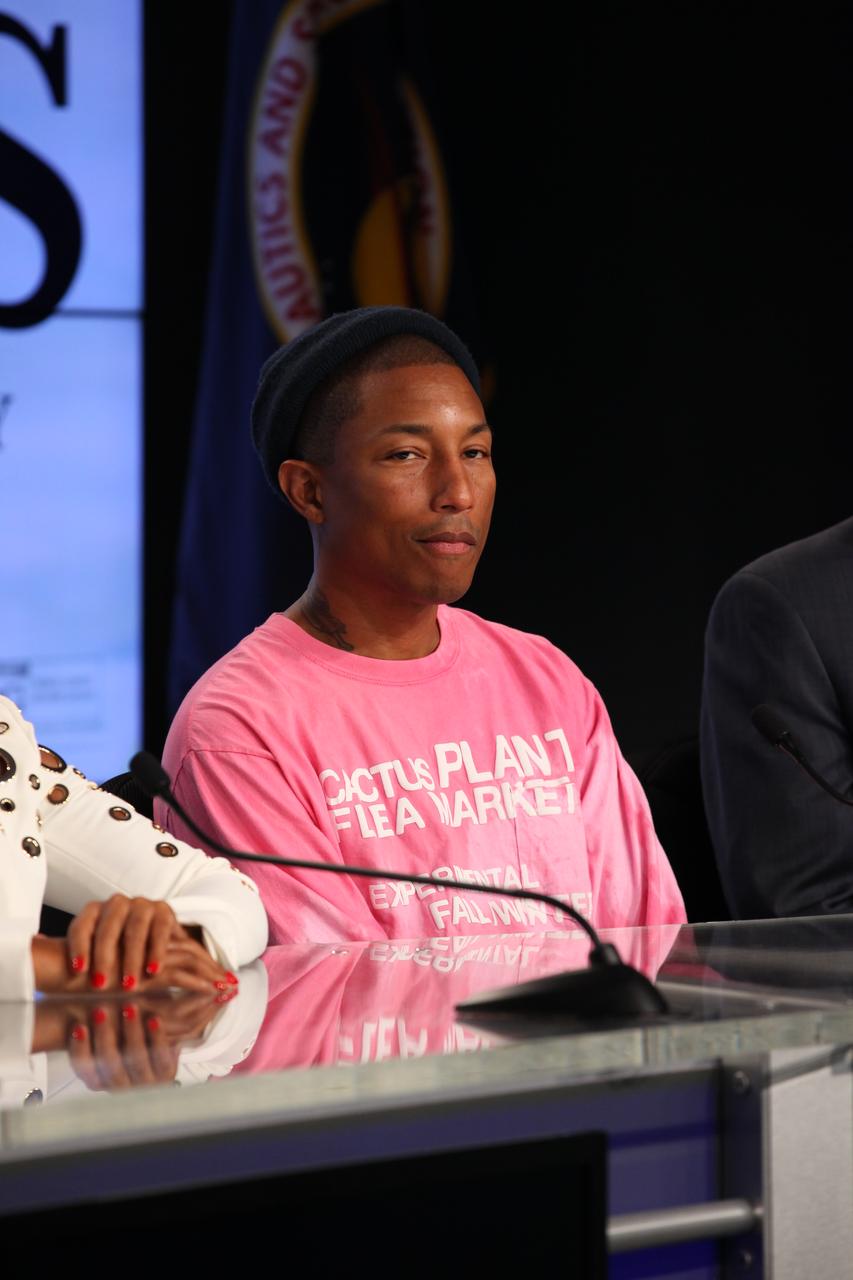 In the Press Site auditorium at the Kennedy Space Center in Florida, Pharrell Williams, musician and producer of “Hidden Figures" speaks to members of the media during a news conference with other key individuals involved in the upcoming motion picture. The movie is based on the book of the same title, by Margot Lee Shetterly. It chronicles the lives of Katherine Johnson, Dorothy Vaughan and Mary Jackson, three African-American women who worked for NASA as human "computers.” Their mathematical calculations were crucial to the success of Project Mercury missions including John Glenn’s orbital flight aboard Friendship 7 in 1962. The film is due in theaters in January 2017.
