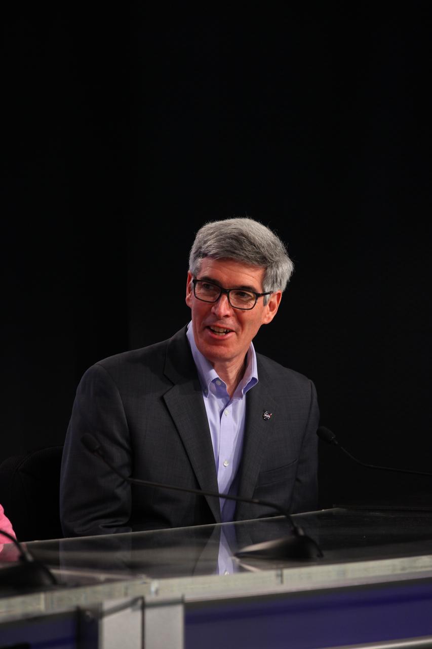 In the Press Site auditorium at the Kennedy Space Center in Florida, Bill Barry, NASA's chief historian, speaks to members of the media during a a news conference with key individuals involved in the upcoming motion picture "Hidden Figures." The movie is based on the book of the same title, by Margot Lee Shetterly. It chronicles the lives of Katherine Johnson, Dorothy Vaughan and Mary Jackson, three African-American women who worked for NASA as human "computers.” Their mathematical calculations were crucial to the success of Project Mercury missions including John Glenn’s orbital flight aboard Friendship 7 in 1962. The film is due in theaters in January 2017.