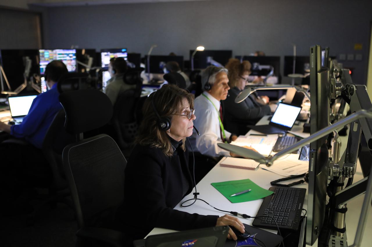 In the Mission Director's Center at Cape Canaveral Air Force Station, members of the launch team monitor the progress of preparations to launch eight Cyclone Global Navigation Satellite System, or CYGNSS, spacecraft. The CYGNSS satellites will make frequent and accurate measurements of ocean surface winds throughout the life cycle of tropical storms and hurricanes. The data that CYGNSS provides will enable scientists to probe key air-sea interaction processes that take place near the core of storms, which are rapidly changing and play a crucial role in the beginning and intensification of hurricanes.