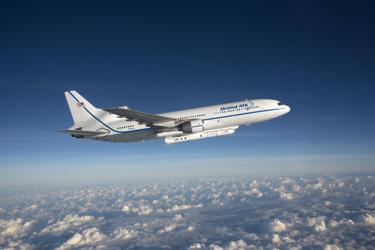Photographed from the F-18 pathfinder aircraft, the Orbital ATK L-1011 Stargazer aircraft is seen flying over the Atlantic Ocean offshore from Daytona Beach, Florida. Attached beneath the aircraft is the Pegasus XL rocket with eight Cyclone Global Navigation Satellite System, or CYGNSS, spacecraft. The CYGNSS satellites will make frequent and accurate measurements of ocean surface winds throughout the life cycle of tropical storms and hurricanes. The data that CYGNSS provides will enable scientists to probe key air-sea interaction processes that take place near the core of storms, which are rapidly changing and play a crucial role in the beginning and intensification of hurricanes.