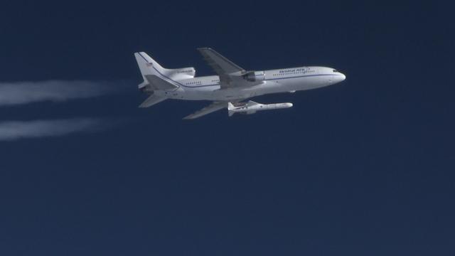 The Orbital ATK Pegasus XL rocket carrying NASA's Cyclone Global Navigation Satellite System, or CYGNSS, spacecraft is released and the first stage ignites at 8:37 a.m. EST. The rocket was released from the Orbital ATK L-1011 Stargazer aircraft flying over the Atlantic Ocean offshore from Daytona Beach, Florida following takeoff from the Skid Strip at Cape Canaveral Air Force Station. This image was taken from a NASA F-18 chase plane provided by Armstrong Flight Research Center in California. The CYGNSS satellites will make frequent and accurate measurements of ocean surface winds throughout the life cycle of tropical storms and hurricanes.