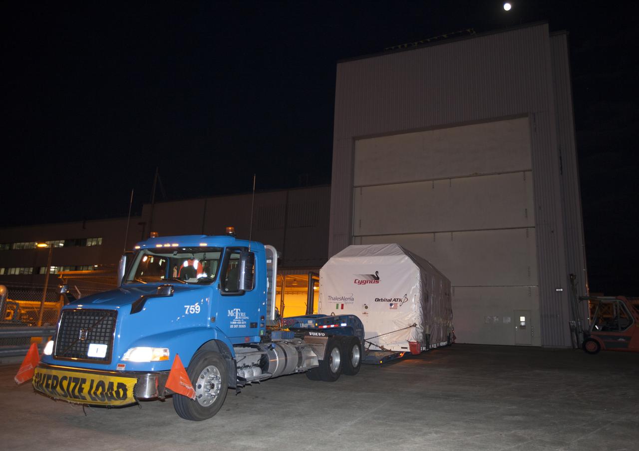 The Orbital ATK OA-7 Cygnus spacecraft's pressurized cargo module (PCM) arrives at the Space Station Processing Facility of NASA's Kennedy Space Center in Florida. The PCM is sealed in an environmentally controlled shipping container, pulled in by truck on a low-boy flatbed trailer. Scheduled to launch in March 2017, the Orbital ATK OA-7 mission will lift off atop a United Launch Alliance Atlas V rocket from Space launch Complex 41 at Cape Canaveral Air Force Station. The commercial resupply services mission to the International Space Station will deliver thousands of pounds of supplies, equipment and scientific research materials that improve life on Earth and drive progress toward future space exploration.
