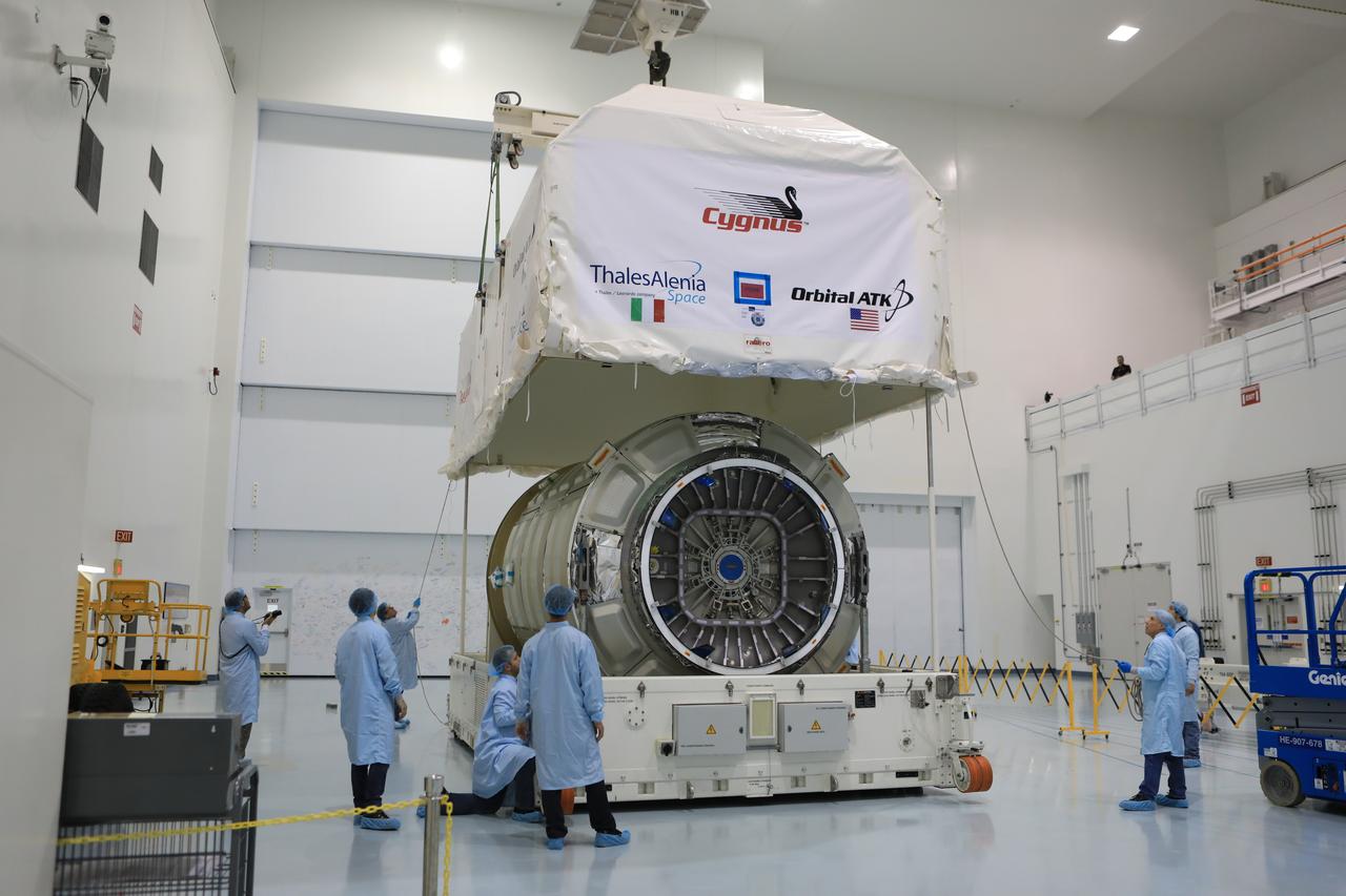 Inside the high bay of the Space Station Processing Facility of NASA's Kennedy Space Center in Florida engineers and technicians remove the Orbital ATK OA-7 Cygnus spacecraft's pressurized cargo module (PCM) from its environmentally controlled shipping container. Scheduled to launch on March 19, 2017, the Orbital ATK OA-7 mission will lift off atop a United Launch Alliance Atlas V rocket from Space launch Complex 41 at Cape Canaveral Air Force Station. The commercial resupply services mission to the International Space Station will deliver thousands of pounds of supplies, equipment and scientific research materials that improve life on Earth and drive progress toward future space exploration.