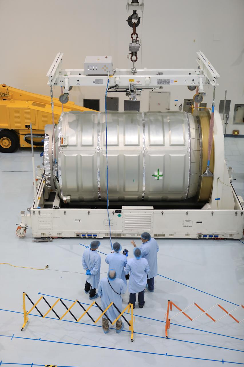 Inside the high bay of the Space Station Processing Facility of NASA's Kennedy Space Center in Florida engineers and technicians remove the Orbital ATK OA-7 Cygnus spacecraft's pressurized cargo module (PCM) from its environmentally controlled shipping container. Scheduled to launch on March 19, 2017, the Orbital ATK OA-7 mission will lift off atop a United Launch Alliance Atlas V rocket from Space launch Complex 41 at Cape Canaveral Air Force Station. The commercial resupply services mission to the International Space Station will deliver thousands of pounds of supplies, equipment and scientific research materials that improve life on Earth and drive progress toward future space exploration.