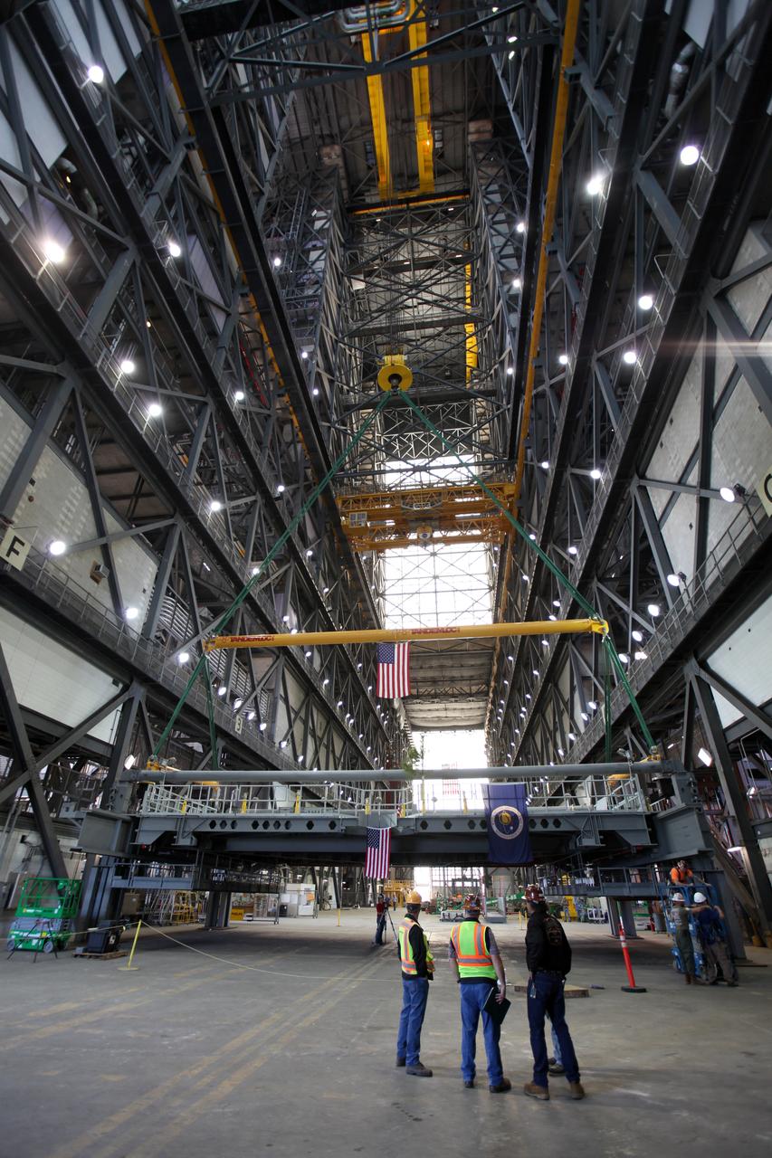 Preparations are underway to lift the final work platform, A north, up from the transfer aisle in the Vehicle Assembly Building (VAB) at NASA's Kennedy Space Center in Florida. The platform will be installed and secured on its rail beam high up on the north wall of High Bay 3. The installation of the final topmost level completes the 10 levels of work platforms, 20 platform halves altogether, that will surround NASA's Space Launch System rocket and the Orion spacecraft and allow access during processing for missions, including the first uncrewed flight test of Orion atop the SLS rocket in 2018. The A-level platforms will provide access to the Orion spacecraft's Launch Abort System for Orion lifting sling removal and installation of the closeout panels. The Ground Systems Development and Operations Program, with support from the center's Engineering Directorate, is overseeing upgrades and modifications to the VAB, including installation of the new work platforms.