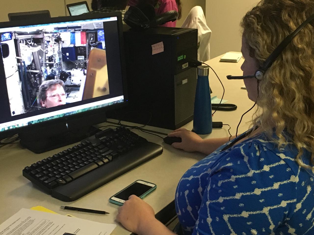 Veggie Project Manager Nicole Dufour provides real-time instructions to astronaut Peggy Whitson aboard the International Space Station as she initiates the latest Veggie experiment.