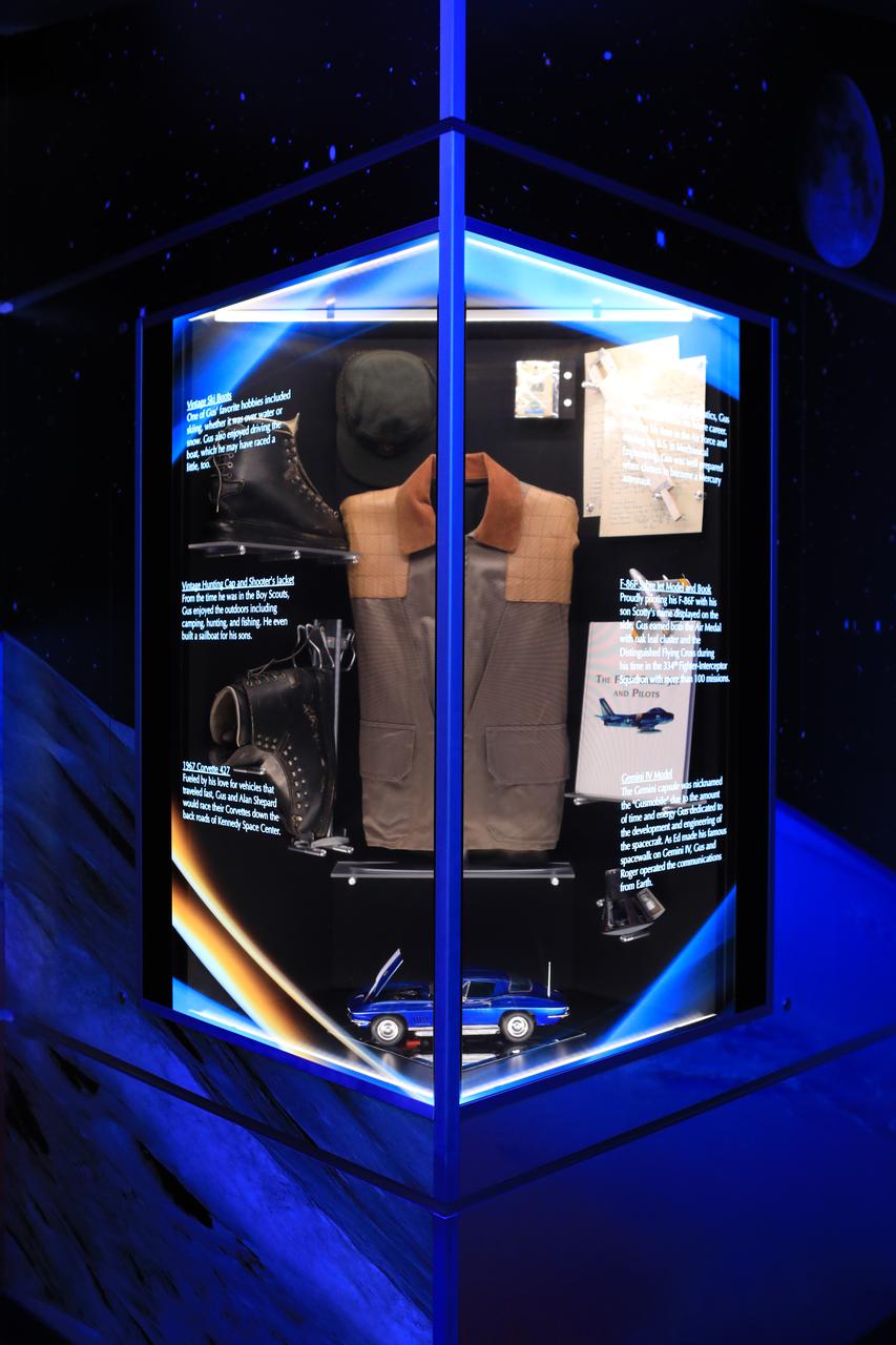 A display case dedicated to astronaut Gus Grissom is shown inside the new tribute to the crew of Apollo 1 who perished in a fire at the launch pad on Jan. 27, 1967, during training for the mission. Grissom, Ed White II and Roger Chaffee were lost during the fire. The tribute at the Apollo/Saturn V Center at NASA's Kennedy Space Center opened Jan. 27, 2017, 50 years after the crew of three was lost. It features numerous items recalling the lives of the three astronauts. It also includes the three-part hatch to the spacecraft itself, the first time any part of the Apollo 1 spacecraft has been displayed publicly. A version of the hatch after it was redesigned is also showcased as an example of improvements NASA made throughout the agency and to the Apollo spacecraft that would later carry astronauts to the moon. 