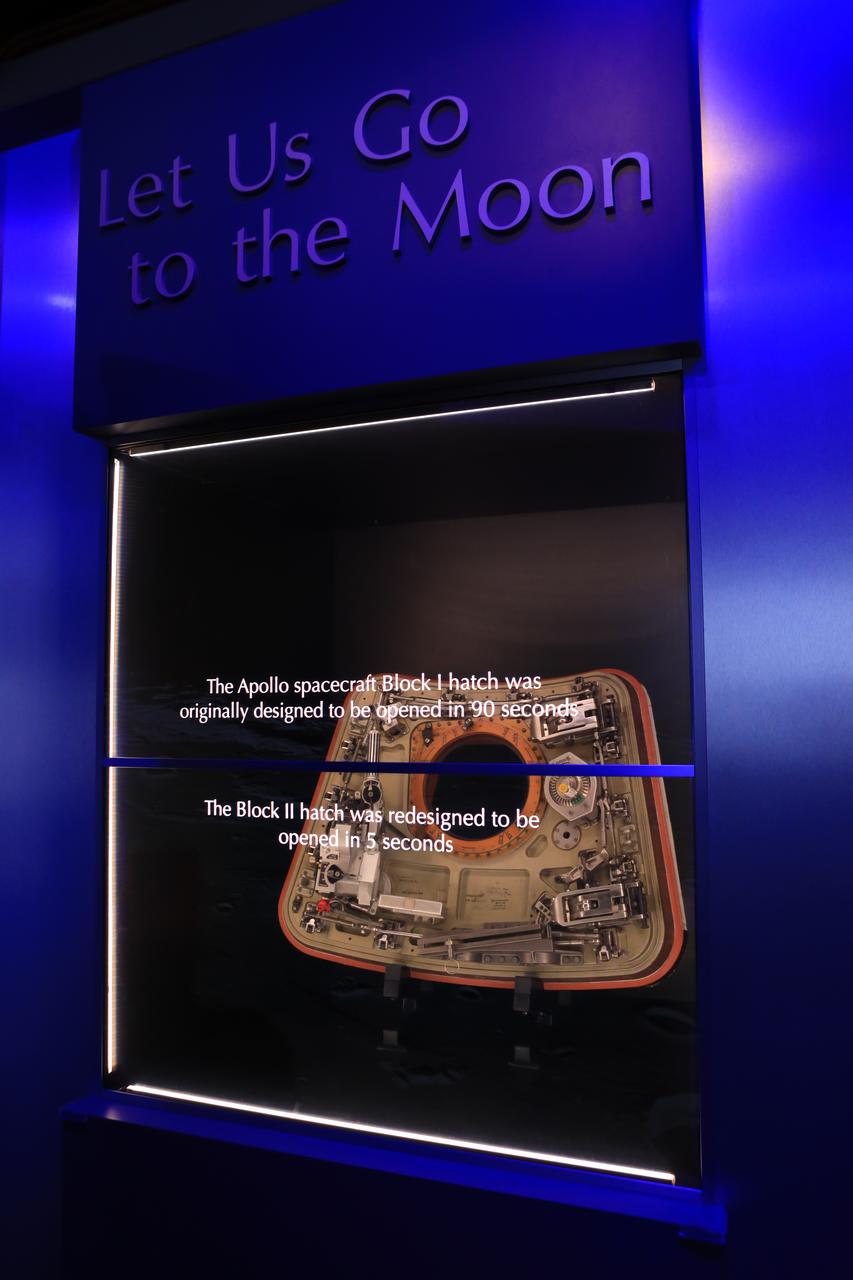 A redesigned hatch for an Apollo spacecraft is shown inside the new tribute to the crew of Apollo 1 who perished in a fire at the launch pad on Jan. 27, 1967, during training for the mission. Astronauts Gus Grissom, Ed White II and Roger Chaffee were lost during the fire. The tribute at the Apollo/Saturn V Center at NASA's Kennedy Space Center opened Jan. 27, 2017, 50 years after the crew of three was lost. It features numerous items recalling the lives of the three astronauts. The tribute also includes the three-part hatch to the spacecraft itself, the first time any part of the Apollo 1 spacecraft has been displayed publicly. The version of the hatch after it was redesigned was also showcased as an example of improvements NASA made throughout the agency and to the Apollo spacecraft that would later carry astronauts to the moon.