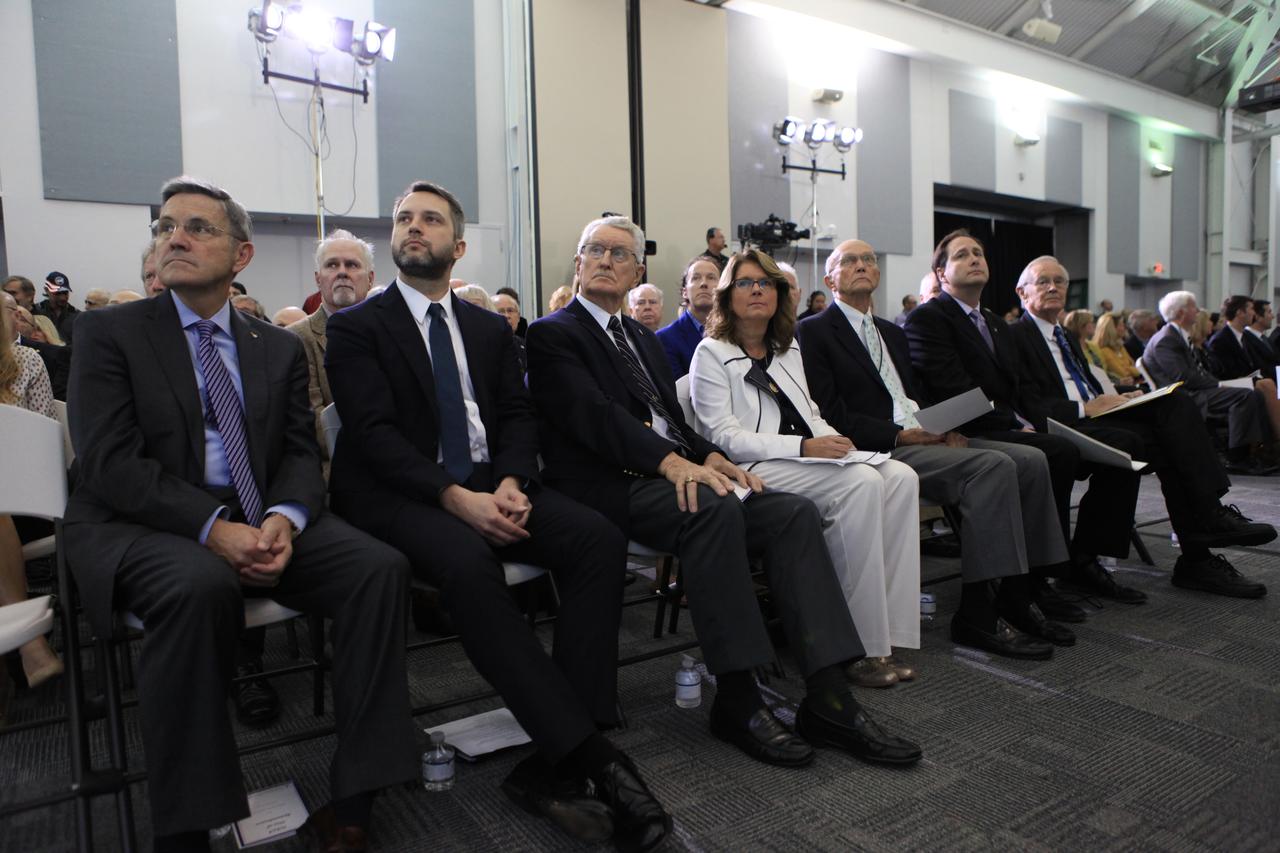 NASA officials, family members and other invited guests listen to remarks during Kennedy Space Center's Day of Remembrance ceremony. From left to right are Kennedy Space Center Director Bob Cabana; contemporary Christian musician Brandon Heath; Apollo launch team member John Tribe; Sheryl Chaffee, daughter of Apollo 1 astronaut Roger Chaffee; astronaut Michael Collins; NASA Acting Administrator Robert Lightfoot; and astronaut Charlie Duke. Held this year in the Center for Space Education at the Kennedy Space Center Visitor Complex in Florida, the annual event honors the contributions of all astronauts who lost their lives in the quest for space exploration.