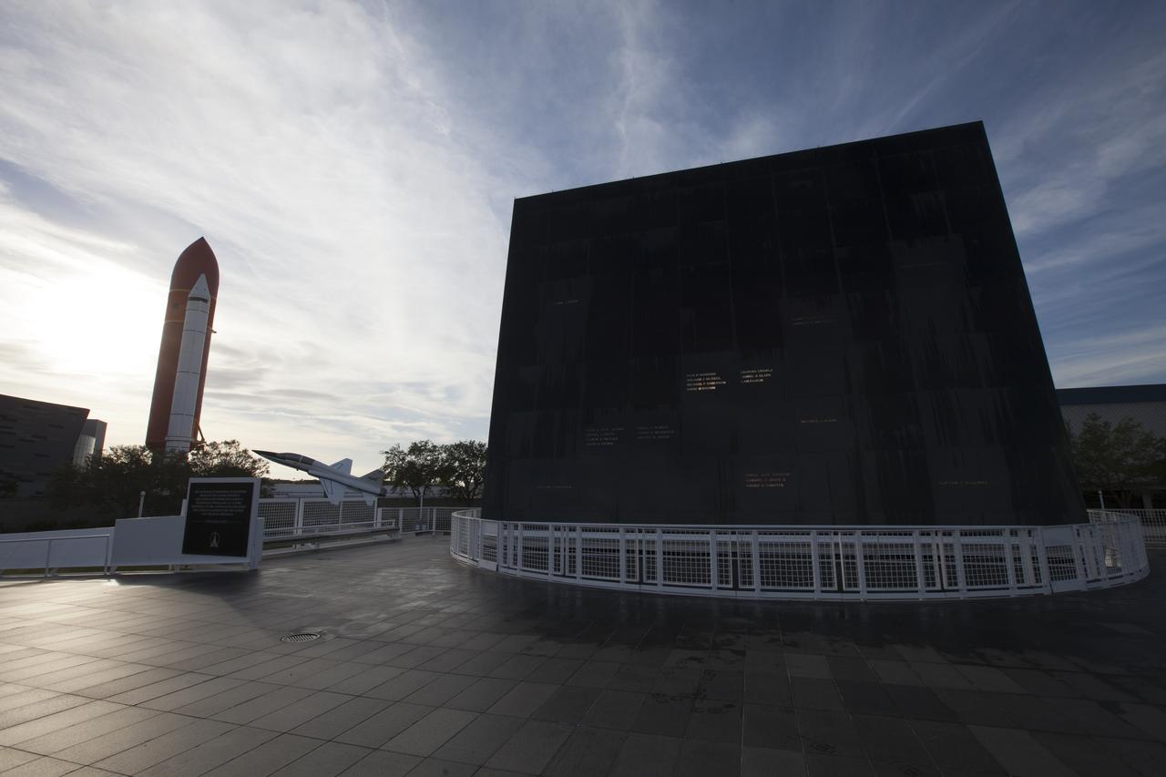 Early morning sunlight illuminates the Space Mirror Memorial at Kennedy Space Center Visitor Complex in Florida, where a wreath-laying ceremony will take place as part of Kennedy Space Center's Day of Remembrance. The annual event honors the contributions of all astronauts who lost their lives in the quest for space exploration.