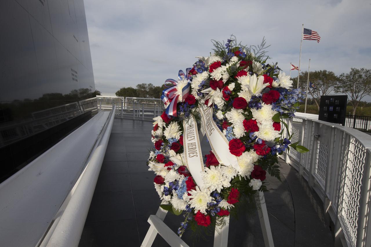 A wreath is placed near the Space Mirror Memorial at the Kennedy Space Center Visitor Complex in preparation for Kennedy Space Center's Day of Remembrance ceremony. The annual event honors the contributions of all astronauts who lost their lives in the quest for space exploration.