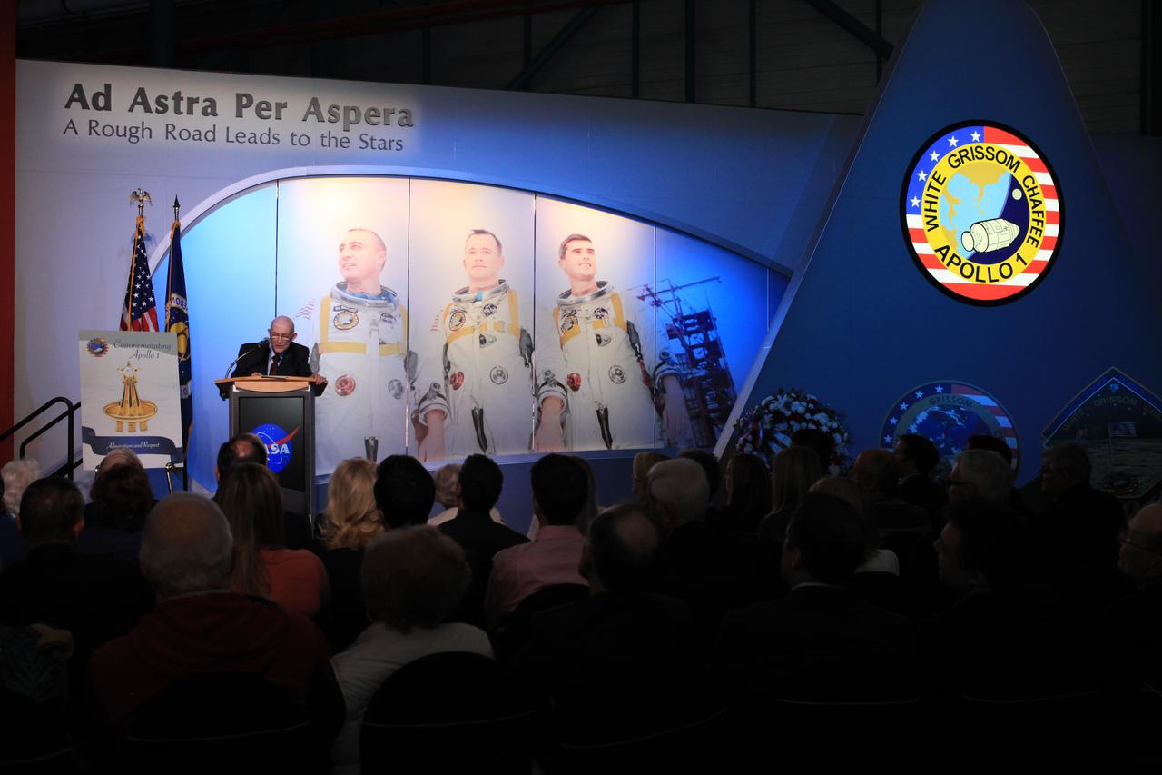 Former Gemini and Apollo astronaut Tom Stafford speaks during the opening of the tribute exhibition to the Apollo 1 astronauts who perished in a fire at the launch pad on Jan. 27, 1967, during training for the mission. The tribute highlights the lives and careers of astronauts Gus Grissom, Ed White II and Roger Chaffee who were lost during the fire. The tribute at the Apollo/Saturn V Center at NASA's Kennedy Space Center opened Jan. 27, 2017, 50 years after the crew of three was lost. It features numerous items recalling the lives of the three astronauts. The tribute also includes the three-part hatch to the spacecraft itself, the first time any part of the Apollo 1 spacecraft has been displayed publicly. A version of the hatch after it was redesigned is also showcased as an example of improvements NASA made throughout the agency and to the Apollo spacecraft that would later carry astronauts to the moon.