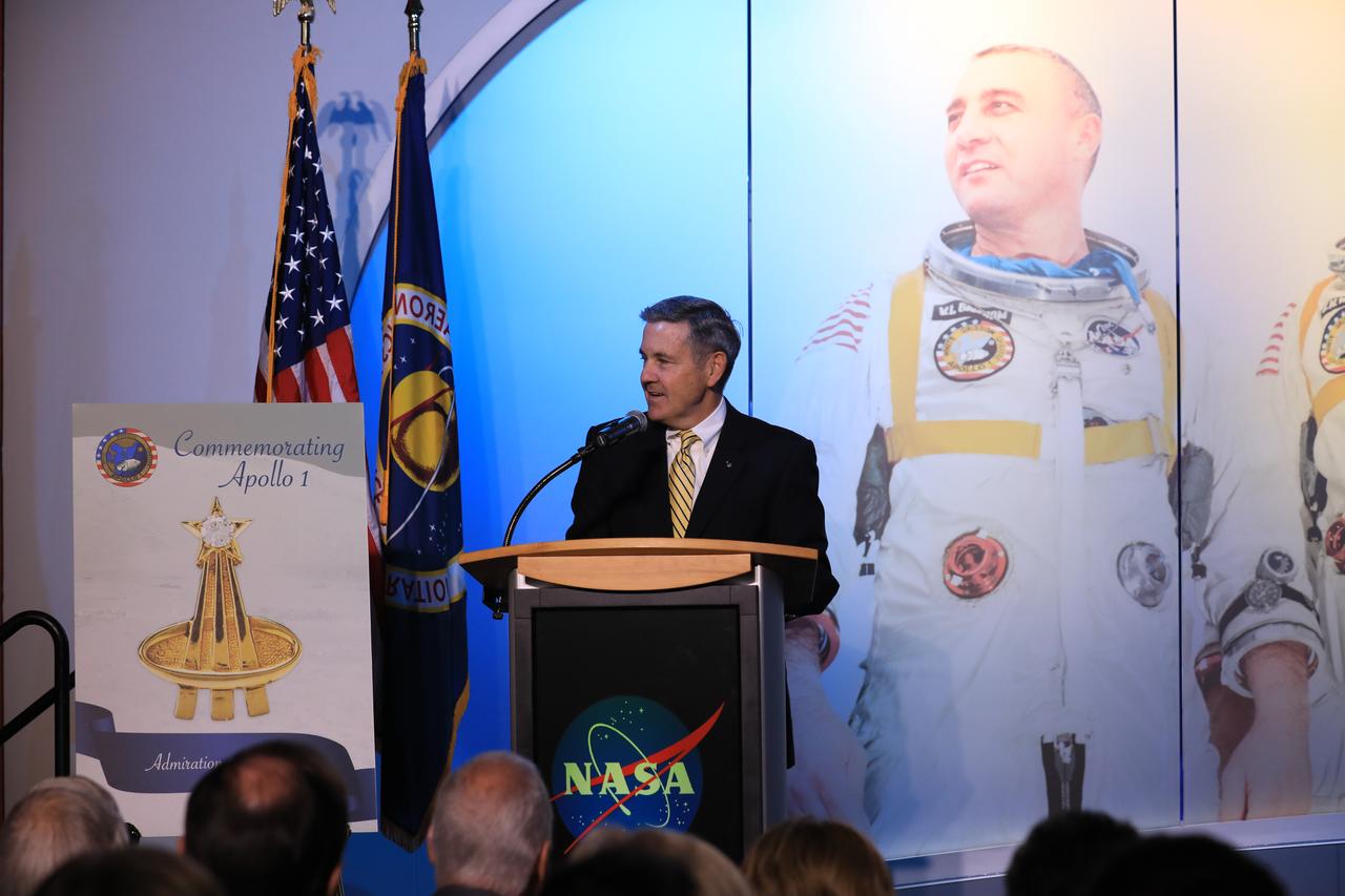 Former astronaut Bob Cabana, director of NASA's Kennedy Space Center in Florida, speaks during the opening of the tribute exhibition to the Apollo 1 astronauts who perished in a fire at the launch pad on Jan. 27, 1967, during training for the mission. The tribute highlights the lives and careers of astronauts Gus Grissom, Ed White II and Roger Chaffee who were lost during the fire. The tribute at the Apollo/Saturn V Center at NASA's Kennedy Space Center opened Jan. 27, 2017, 50 years after the crew of three was lost. It features numerous items recalling the lives of the three astronauts. The tribute also includes the three-part hatch to the spacecraft itself, the first time any part of the Apollo 1 spacecraft has been displayed publicly. A version of the hatch after it was redesigned is also showcased as an example of improvements NASA made throughout the agency and to the Apollo spacecraft that would later carry astronauts to the moon.