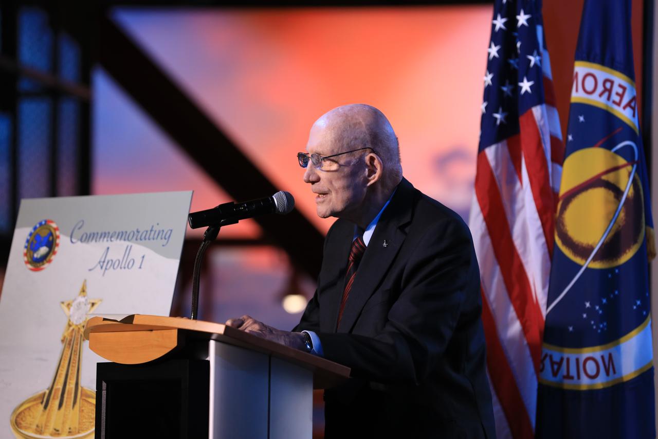 Former Gemini and Apollo astronaut Tom Stafford speaks during the opening of the tribute exhibition to the Apollo 1 astronauts who perished in a fire at the launch pad on Jan. 27, 1967, during training for the mission. The tribute highlights the lives and careers of astronauts Gus Grissom, Ed White II and Roger Chaffee who were lost during the fire. The tribute at the Apollo/Saturn V Center at NASA's Kennedy Space Center opened Jan. 27, 2017, 50 years after the crew of three was lost. It features numerous items recalling the lives of the three astronauts. The tribute also includes the three-part hatch to the spacecraft itself, the first time any part of the Apollo 1 spacecraft has been displayed publicly. A version of the hatch after it was redesigned is also showcased as an example of improvements NASA made throughout the agency and to the Apollo spacecraft that would later carry astronauts to the moon. 