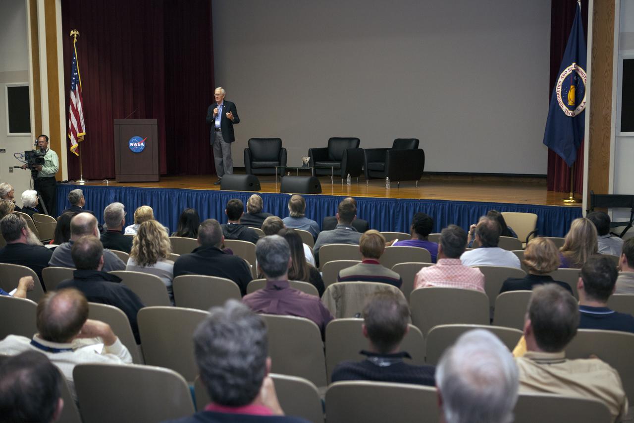 Charlie Duke, former Apollo 16 astronaut and member of the Apollo 1 Emergency Egress Investigation Team, speaks to participants during the Apollo 1 Lessons Learned presentation in the Training Auditorium at NASA's Kennedy Space Center in Florida. The program's theme was "To There and Back Again." Other guest panelists included Ernie Reyes, retired, Apollo 1 senior operations engineer; and John Tribe, retired, Apollo 1 Reaction and Control System lead engineer. The event helped pay tribute to the Apollo 1 crew, Gus Grissom, Ed White II, and Roger Chaffee.